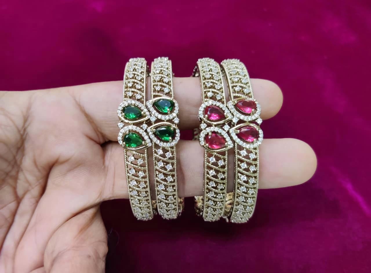 Luxury Kundan Bangles with Emerald & Ruby Stonework