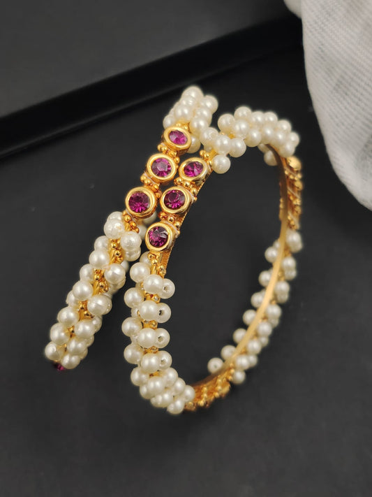 Double‑Row Pearl Bangles with Rani‑Pink Bezel Stones – Gold‑Tone (Set of 2)
