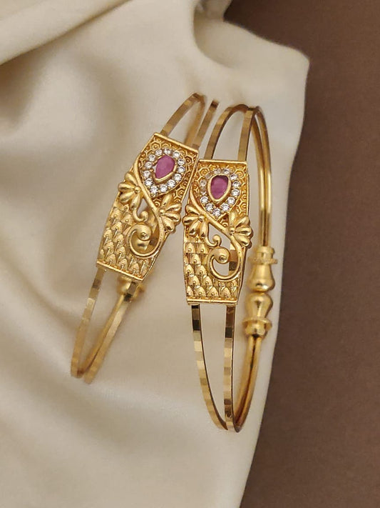 Elegant Gold Bangle Set with Ruby and Diamond Accents